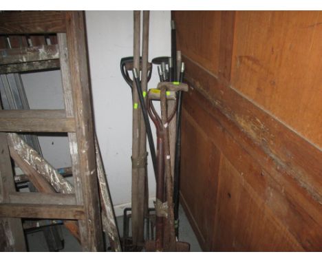 Assorted garden tools, drain rods etc.