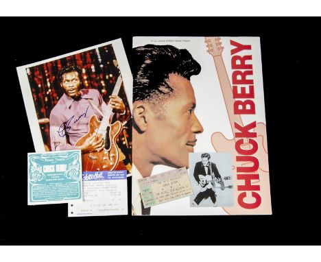 Chuck Berry / Autograph: A 10"x8" colour photograph signed in blue pen sold with 1992 tour programme and three various ticket