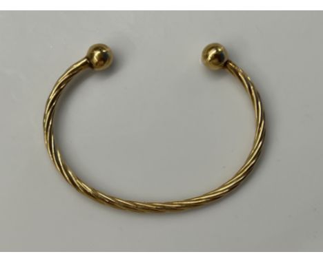 Child’s 9ct gold Torque bangle (3.3g)