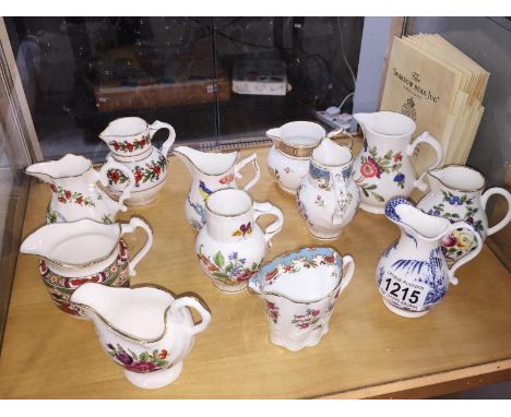 A collection of 12 Royal Worcester miniature jugs of Historic jugs in collaboration with The Dyson Perrins Museum with certif