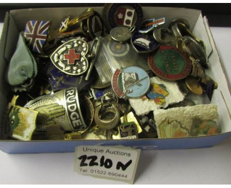 A large quantity of enamel badges etc