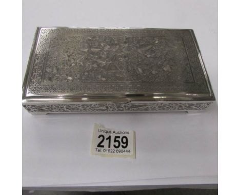 An ornate white metal cigarette/trinket box, (possibly Danish).