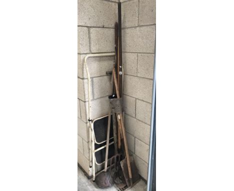 A quantity of garden tools and a step ladder