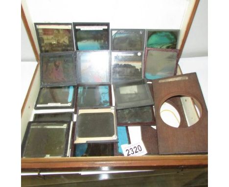 A wooden case containing magic lantern slides.