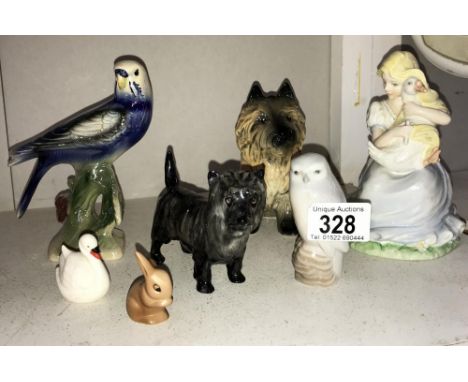 A quantity of animal figures including Beswick Cairn Terrier, Sylvac Cairn Terrier, Holland budgie, Goebel, Royal Copenhagen 