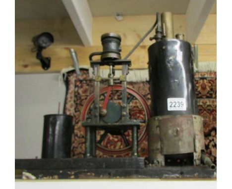 A cross head steam engine and boiler.