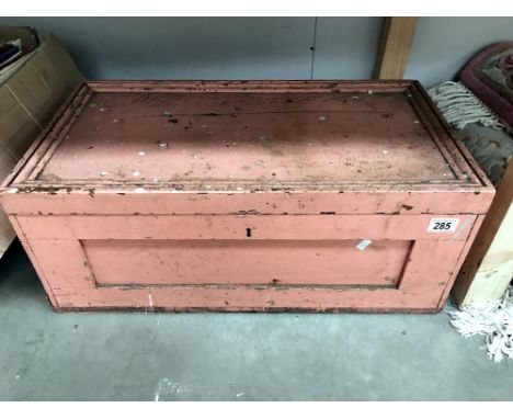 A painted wooden tool box