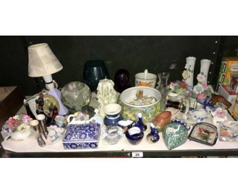 A large shelf of pottery, porcelain and glassware