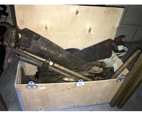 A wooden box of tools
