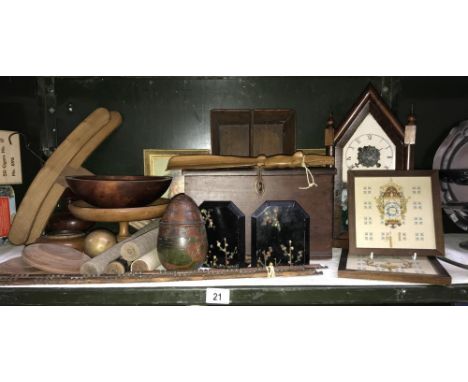 A shelf of wooden items including American gingerbread clock, cutlery tray etc.