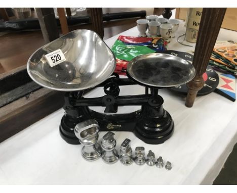 A cast iron set of kitchen scales
