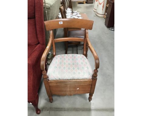A 1930's mahogany commode / carver chair