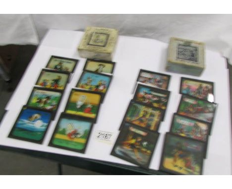 2 sets of coloured magic lantern slides entitled The Queen of Hearts and Hey Diddle Diddle.