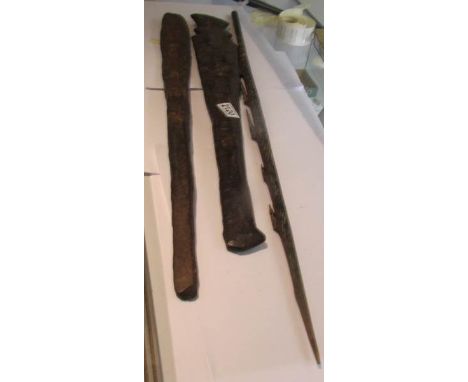 3 North Australian Aboriginal weapons all decorated with ochre hues - a heavy club, a throwing stick and a harpoon (a/f).