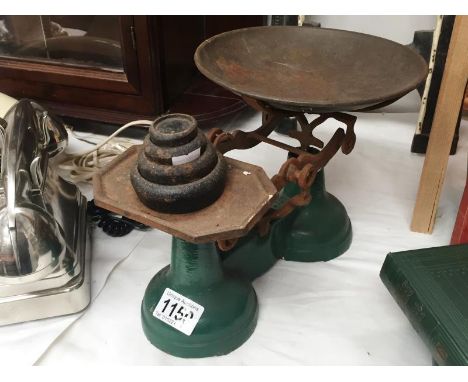 A set of cast iron scales and weights