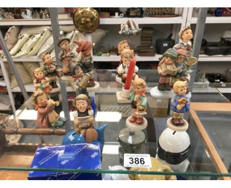 13 Goebel / Hummel figures including little drummer, holiday harmony, advent christmas by candlelight, final issue 2000 etc.