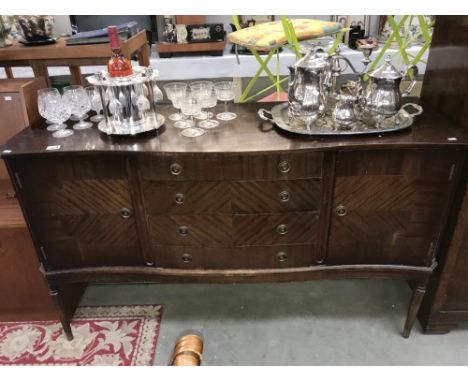 A vintage strongbow furniture darkwood stained sideboard