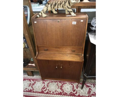 A vintage Remploy teak bureau