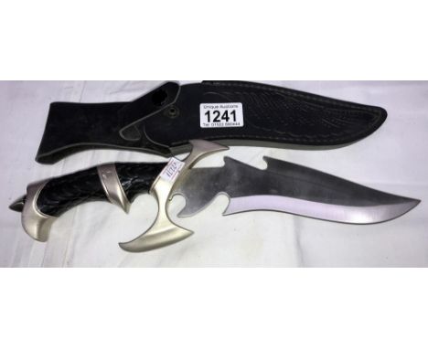 A decorative ornament of a hunting knife