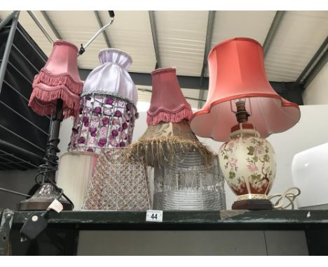 2 lamps and a quantity of vintage lamp sahdes
