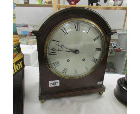 A Whitaker Oldham bracket clock.