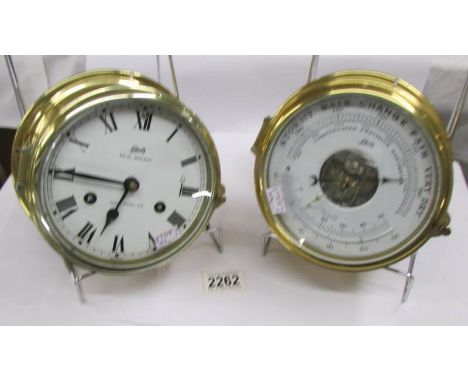 A Schatz Royal Mariner brass ship's clock together with a Schatz brass ship's barometer.