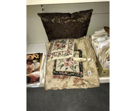 A tapestry throw and 3 cushions