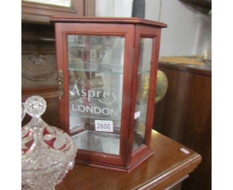 A jewellery display cabinet 'Asprey, London'.