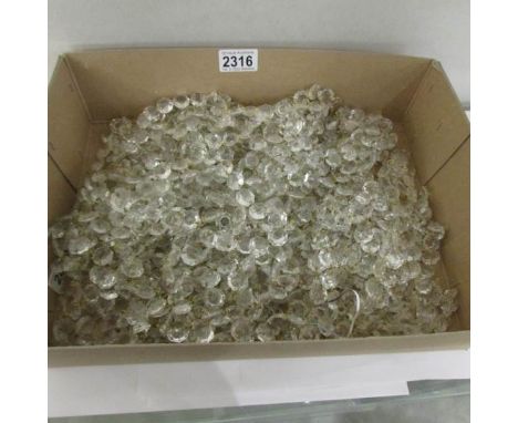 A large quantity of  chandelier buttons.