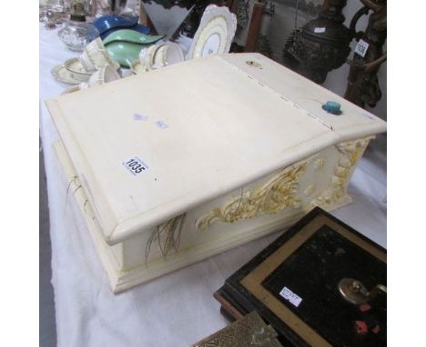 A slope front writing box with feather pen and 2 facsimile Ephemera pieces (Elizabeth R).