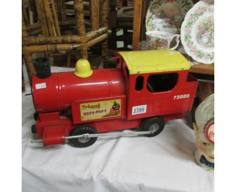 A Tri-Ang tin plate 'Puff Puff' engine.