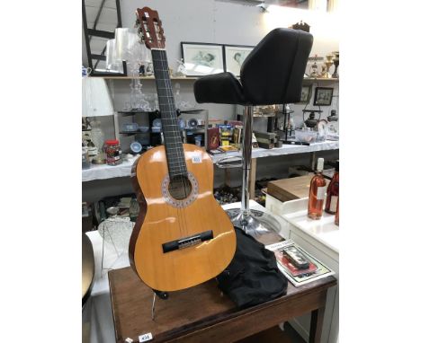 A Hohner guitar and a quality guitar tuner