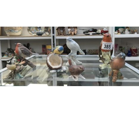 A quantity of bird figures including Beswick, Goebel, Bordes Fine Arts etc.