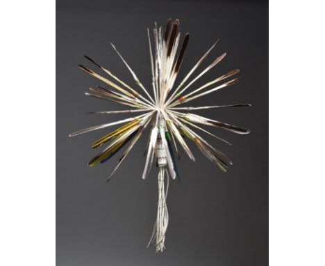 λA Southern Plains peyote fan feathers, coloured glass beadwork and white pigment covered hide tassels with metal bands and a