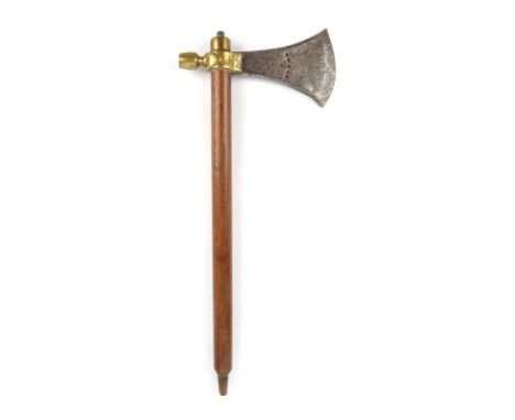 A Plains pipe tomahawk with a pierced steel blade having copper zig-zag inlay to one side and incised linear decoration to th