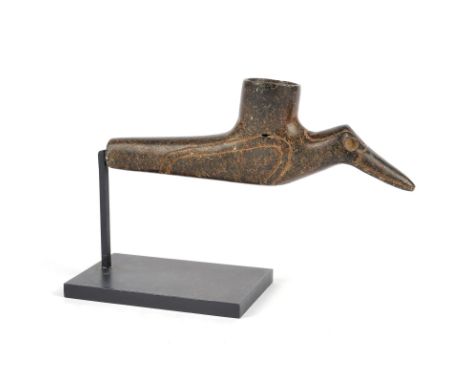 A Mound Builder pipe bowl circa 900 - 1300 AD stone, modelled as a bird with linear outlines and recessed eyes, 13.3cm long, 