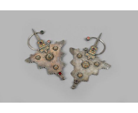 A pair of Berber cloak fibulas Morocco silver coloured metal and enamel, of triangular form with stepped edges and pierced, h