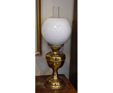 Early 20th Century brass duplex burner table oil lamp having opaque white glass shade   Condition: 