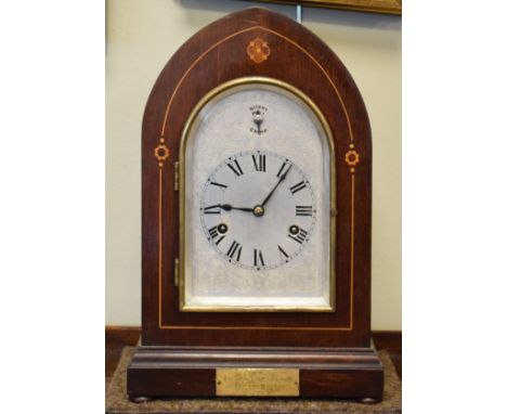 Early 20th Century inlaid mahogany mitre cased mantel clock, the silvered dial with Roman numerals and subsidiary silent/chim
