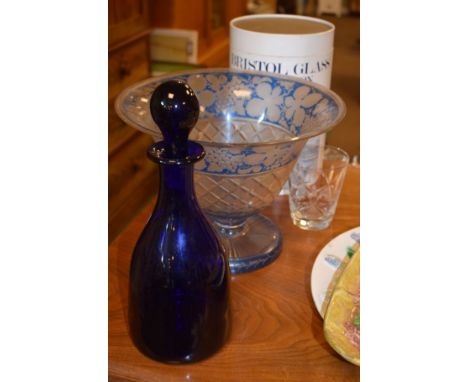 Thomas Webb mallet shaped blue glass decanter and a 19th Century blue glass bowl having engraved vine and grape decoration   