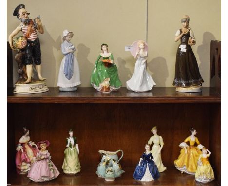 Various modern ceramic figures including; three by Royal Doulton, five by Coalport and various others together with a 1930's 