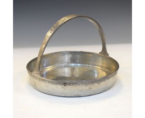 Tudric pewter circular shallow bowl having loop handle with hammered decoration and Celtic motifs, the base stamped Tudric Pe
