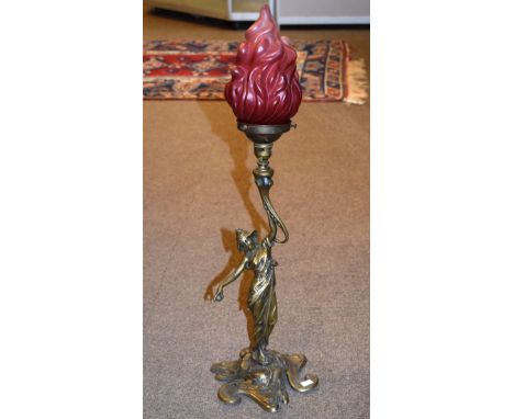 Brass Art Nouveau design figural table lamp having frosted ruby glass shade   Condition: 