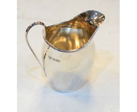 George V silver helmet shaped cream jug, Chester 1930, approx 2.3oz   Condition: 