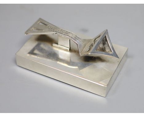 A Tiffany &amp; Co sterling mounted rectangular paperweight, inscribed 'Admiralty Hydroplane Captain A.E. Dunn R.N.R. Invento