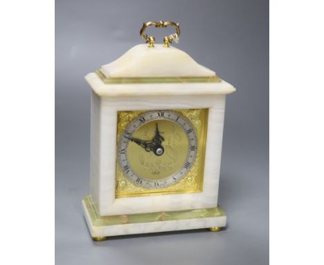 An Elliott onyx mantel clock, retailed by Asprey &amp; Co., height 19cm