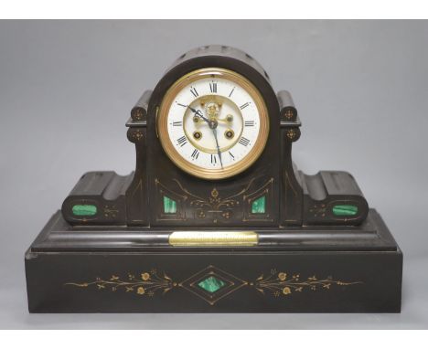 A Victorian black marble and inlaid malachite eight day mantel clock, plaque reads 'Presented to Mr Wintermorgan by the emplo