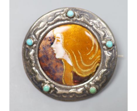 An early 20th century French white metal and turquoise mounted Limoges? enamel circular brooch, 39mm, gross 10 grams.