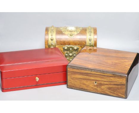 A Garrard rosewood and brass bound dome-topped box, a red leather humidor and a mahogany jewellery box