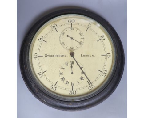 A Synchronome ebonised slave wall clock with two subsidiary dials, later glass not inset to bezel